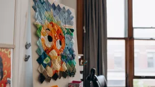 Photo of Lisa's old studio featuring the Orange Bird fabric mosaic