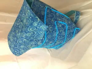 Picture of the front of a blue backpack constructed with blue glowing E L wire 